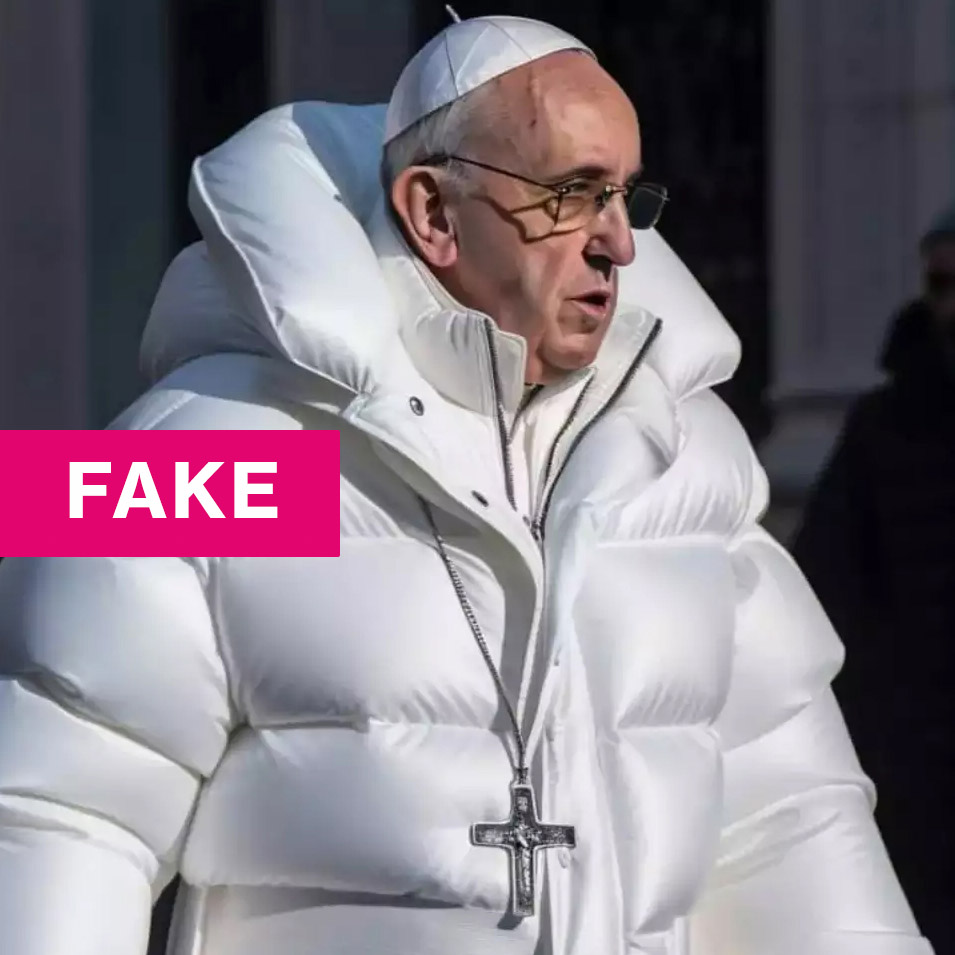 an ai-generated image of the pope in a puffy jacket with FAKE captioned over it